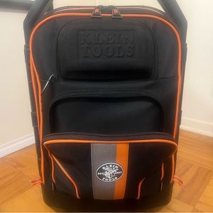 Klein professional rolling tool case w/retractable handle, and light.